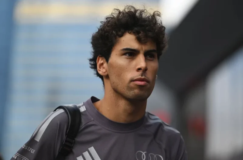 A Young Driver in Audi Kit in the Formula 1 Paddock