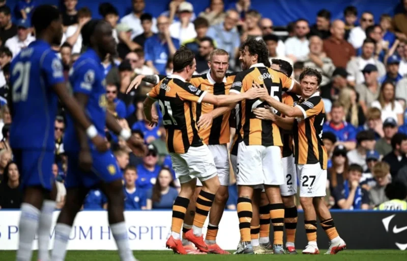 Hull City Players Celebrate a Goal Against Chelsea at Stamford Bridge