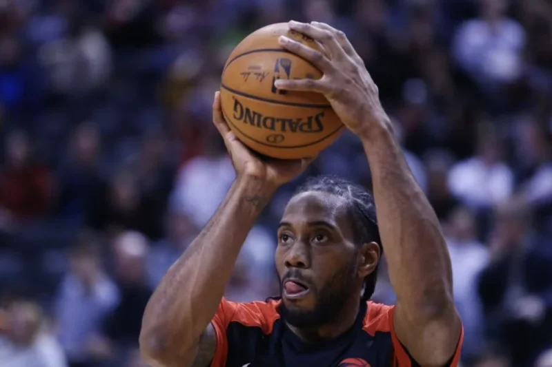 Kawhi Leonard Shoots a Free Throw in the Toronto Raptors Jersey