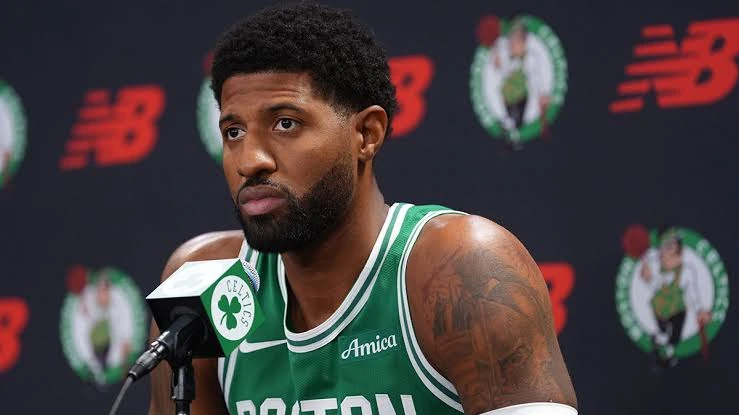Paul George in a Boston Celtics Jersey at a Press Conference