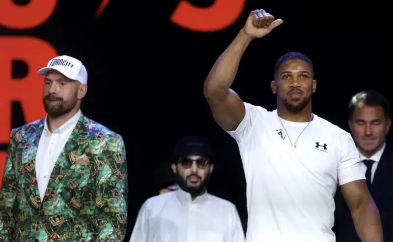 Tyson Fury and Anthony Joshua Pose with Raised Fists Before the Fight